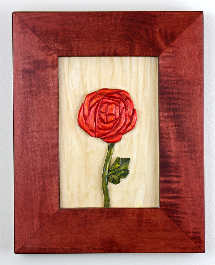 carved rose by Robert W. Lang